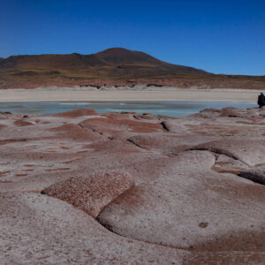 Red stones and altiplanic lagoons Miscanti and Meñiques